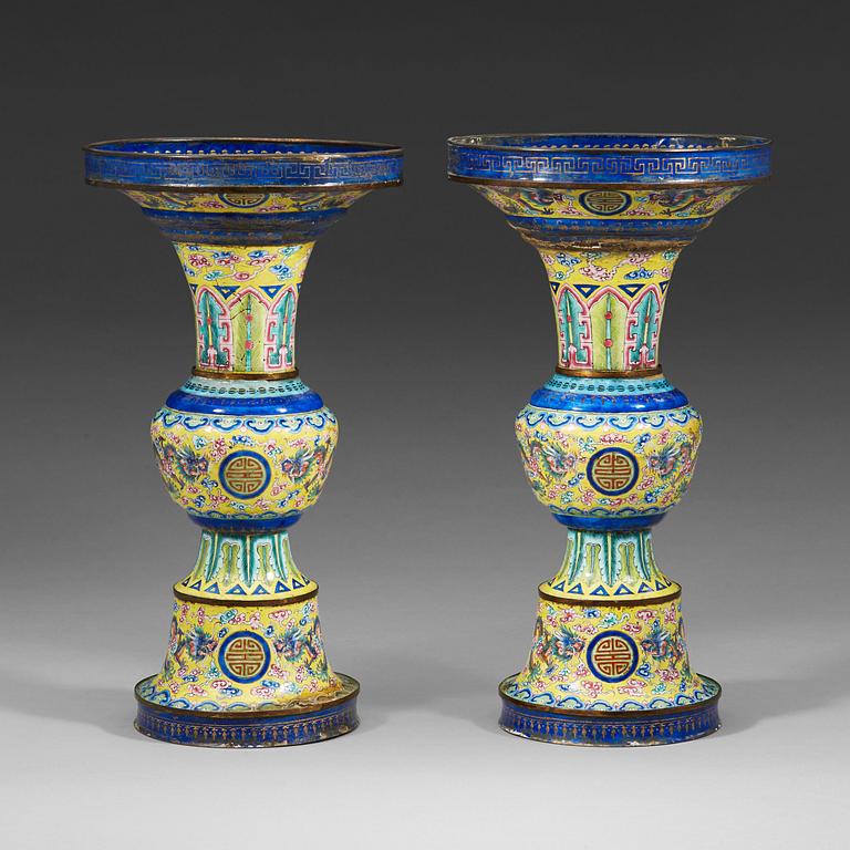 A pair of enamel on copper vases, Qing dynasty, 19th Century.