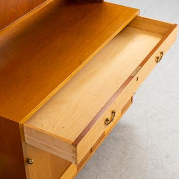 Josef Frank, two mahogany veneered bokkshelves, model 2112, Firma Svenskt Tenn, Sweden.