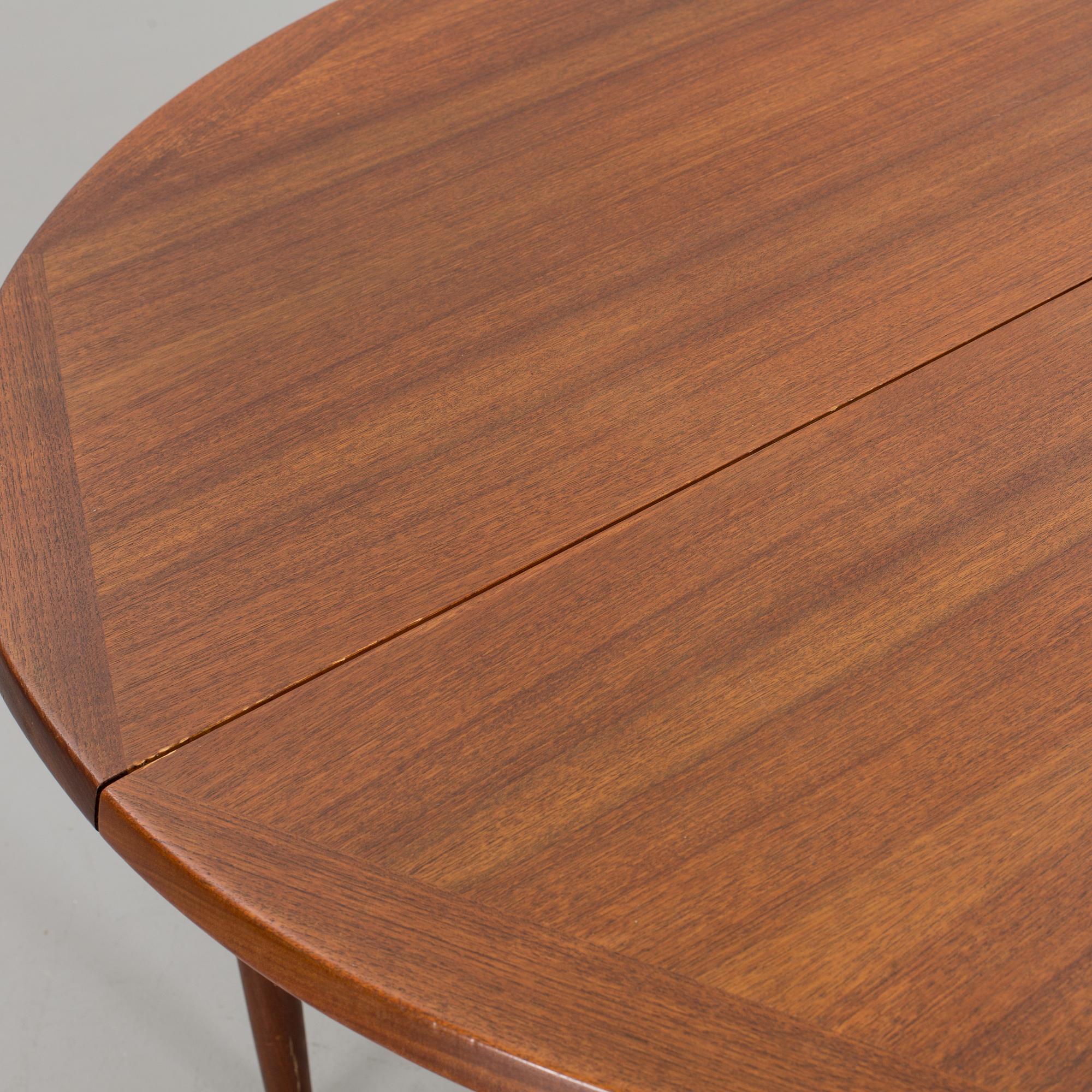 A NORWEGIAN DINNER TABLE, second half of 20th century.