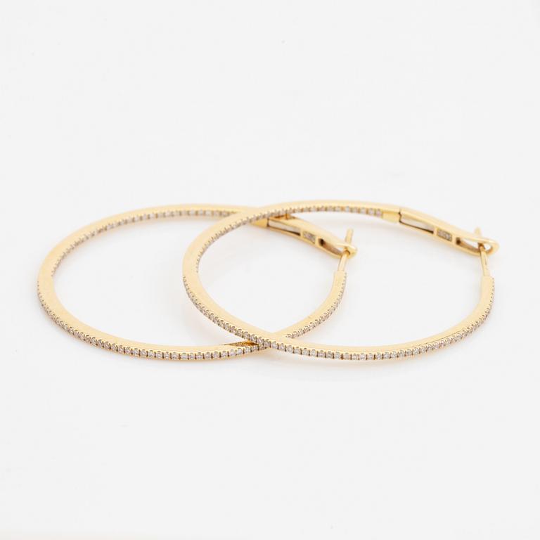 Sophie by Sophie, 18K gold and diamond hoop earrings.