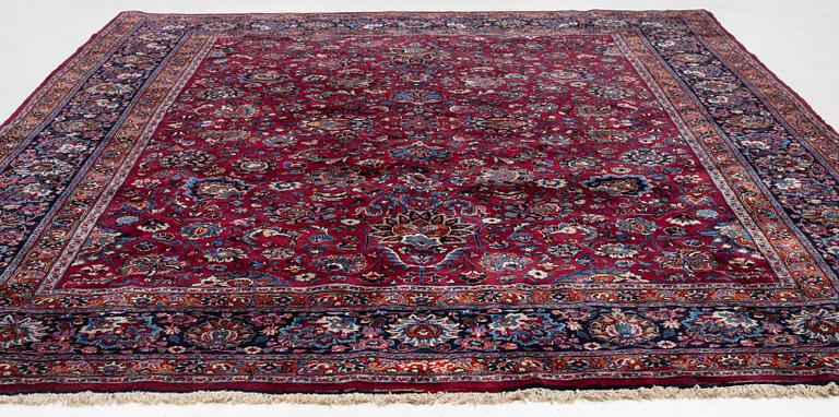 A Meshed carpet, c. 393 x 305 cm.