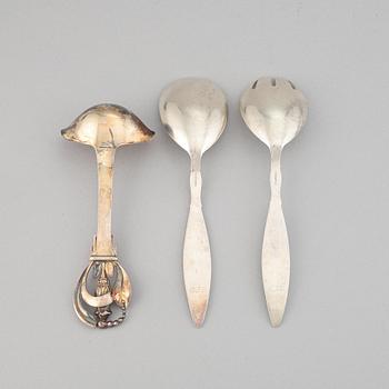 A pair of silver sallad utensils by C.G.Hallberg, Malmö, 1931, and sauce spoon W&S Sorensen, Danmark, early 20th century.
