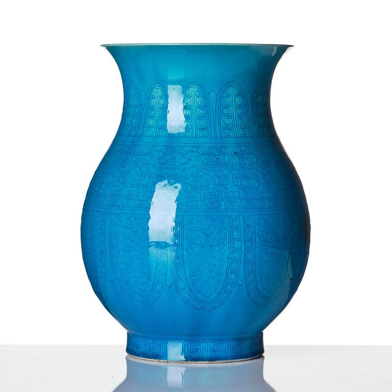 A turquoise glazed vase, zun, Qing dynasty with a Qianlong incised seal mark and of the period.