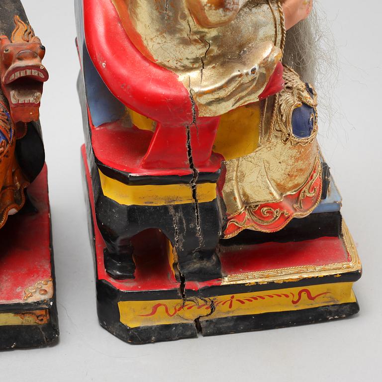 A set of three wooden deities, China, early 20th Century.