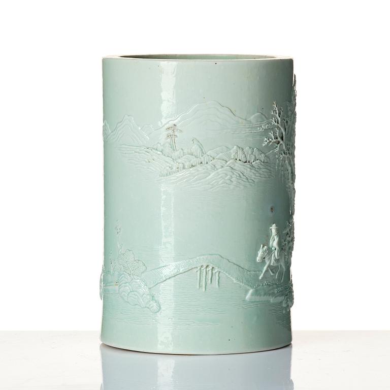 A pale green glazed brush pot, Qing dynasty, 19th Century.