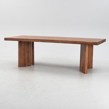 Dusty Deco, a contemporary walnut dining table.