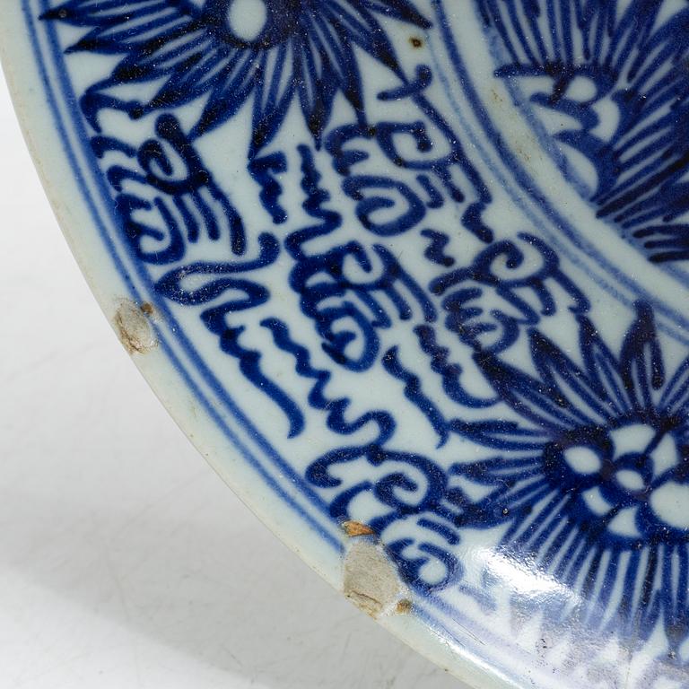 Two similar blue and white porcelain plates, 19th century.