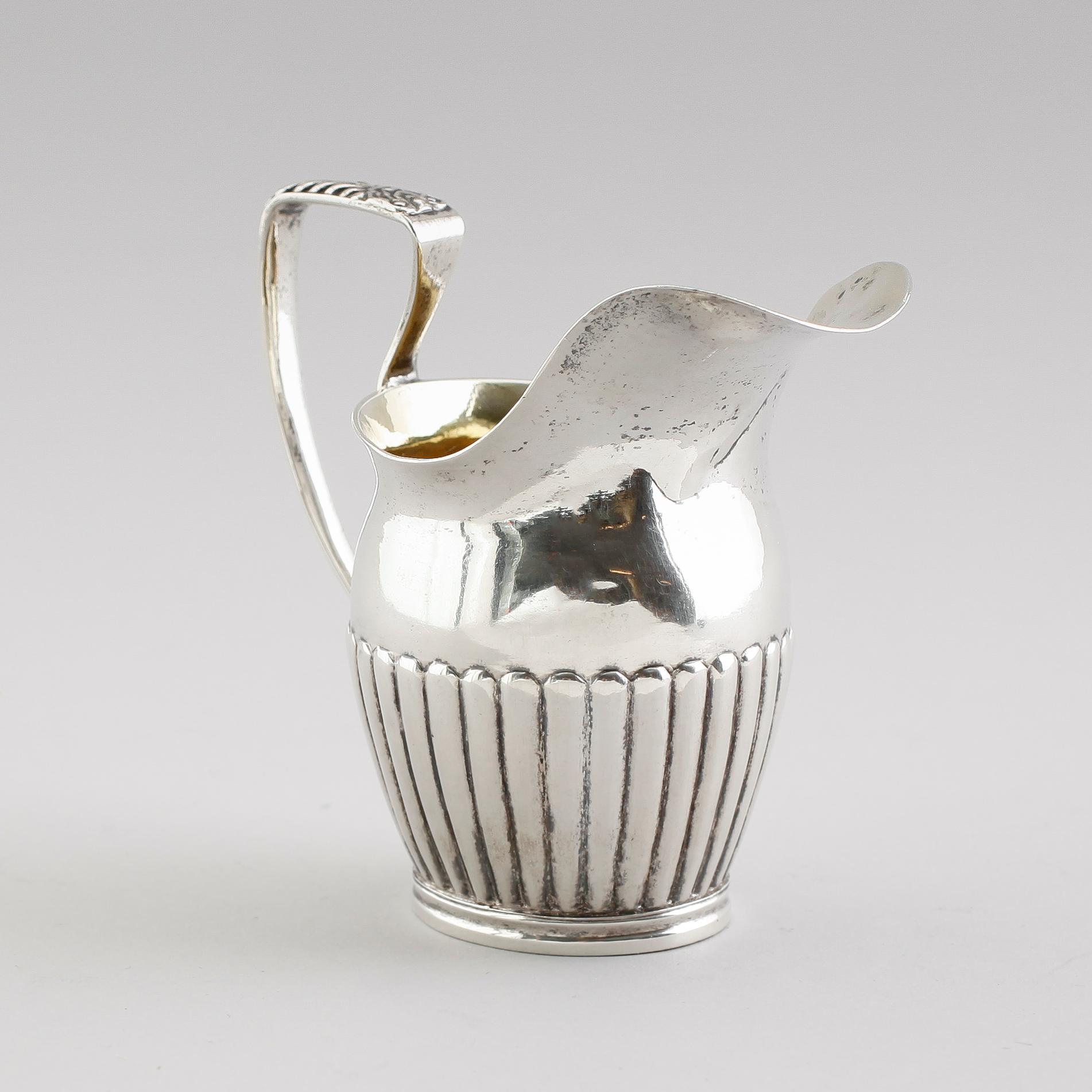 GRÄDDKANNA, silver, Gustaf Folcker, Stockholm 1834. Vikt ca 81 gram.