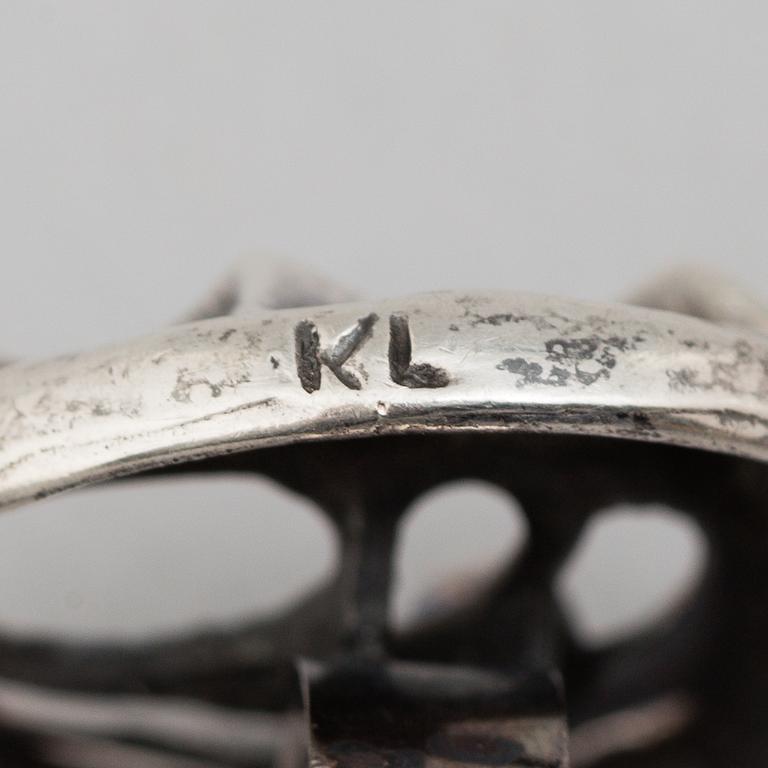 A silver pendant, bracelet and pair of ear rings by Karl Laine, Finland, 1975.