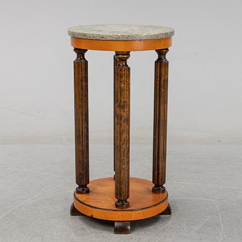 A stone top pedestal, 1920's/30's.