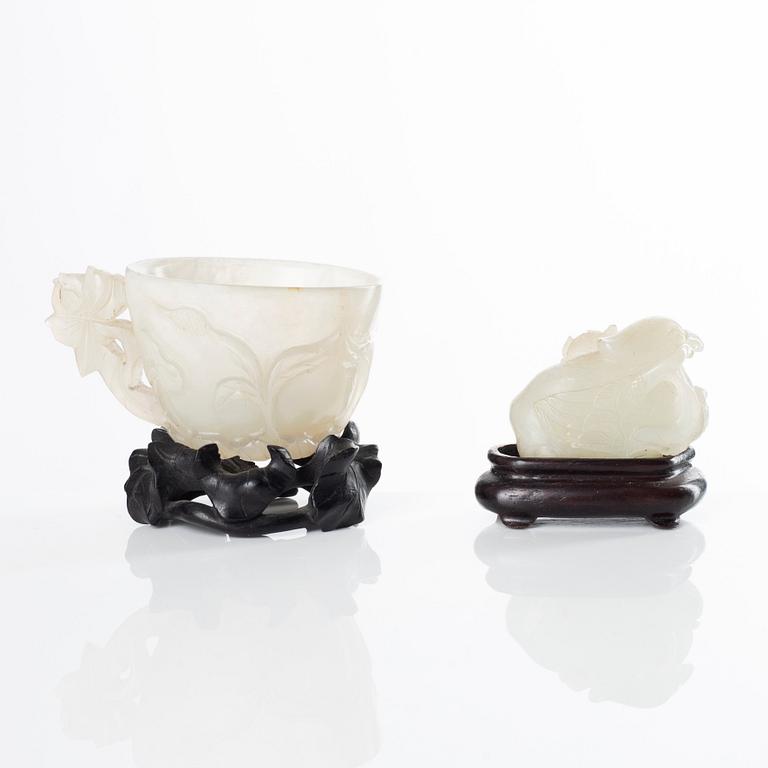 A group of four Chinese sculptured nephrite objects, early 20th Century.