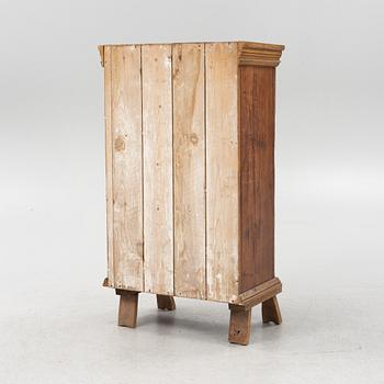A pinewood cabinet, 18th Century.