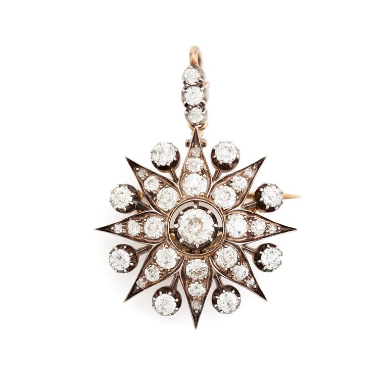 A 19th century gold and silver brooch/pendant set with old-cut diamonds.