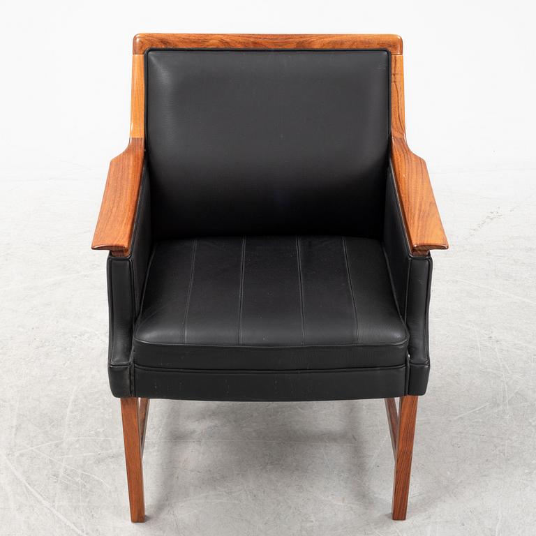Torbjørn Afdal, a 'Minerva' rosewood desk and a chair, Bruksbo, Haug Snekkeri AS, Norway, 1960's.