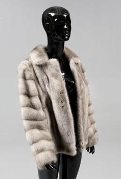 A GRAY MINK FUR JACKET.