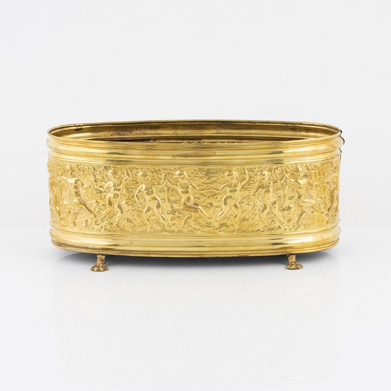 A brass jardiniere, circa 1900.
