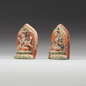 Two clay tsa-tsas, Tibet, 18/19th Century.