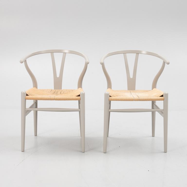 Hans J. Wegner, a pair of model 'CH-24' chairs, Carl Hansen & Søn, Denmark.