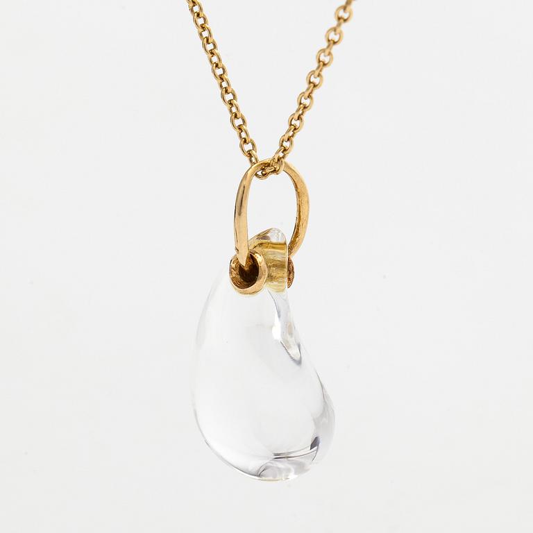 Tiffany & Co, Elsa Peretti, an 18K gold "Teardrop" necklace with a rock crystal pendant.