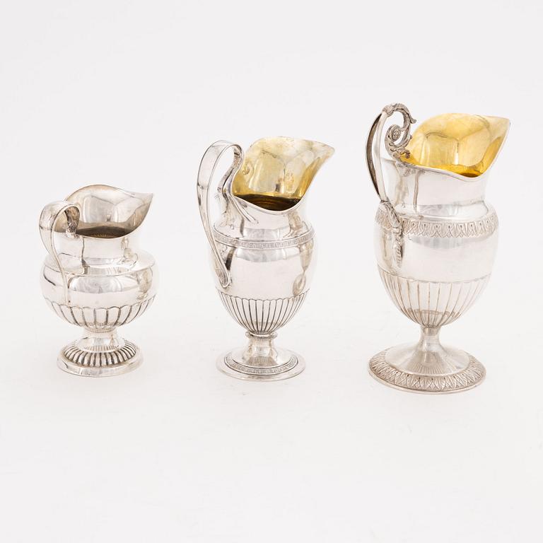 A set of three Swedish silver Empire jugs, first part of the 19th Century.