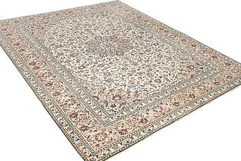 A Kashan carpet, c. 403 x 300 cm.