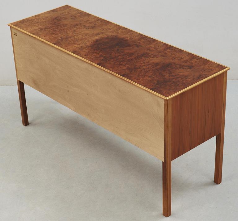 A Josef Frank walnut sideboard with a burrwood top, Svenskt Tenn.