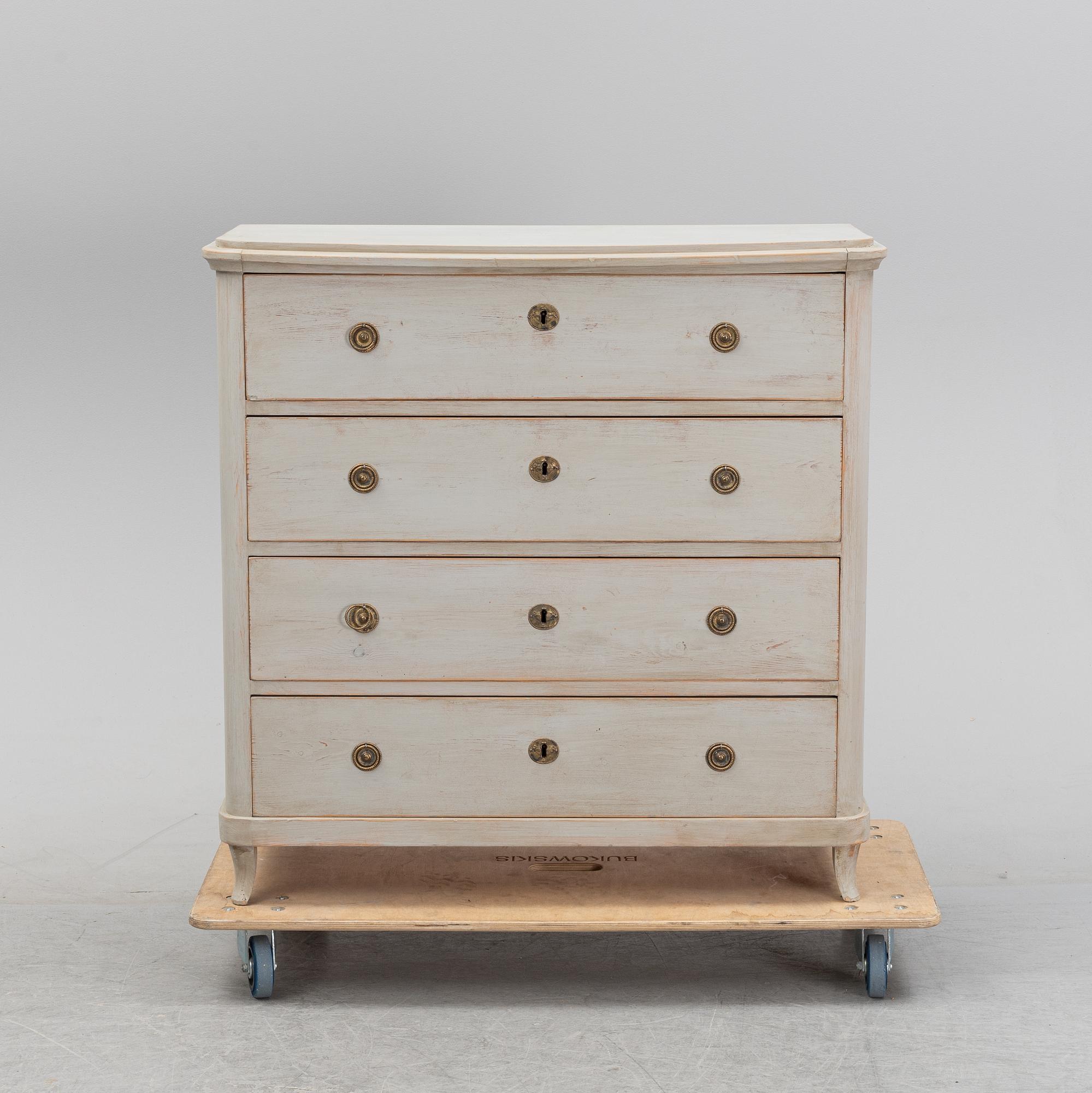 A painted chest of drawers, 19th Century.