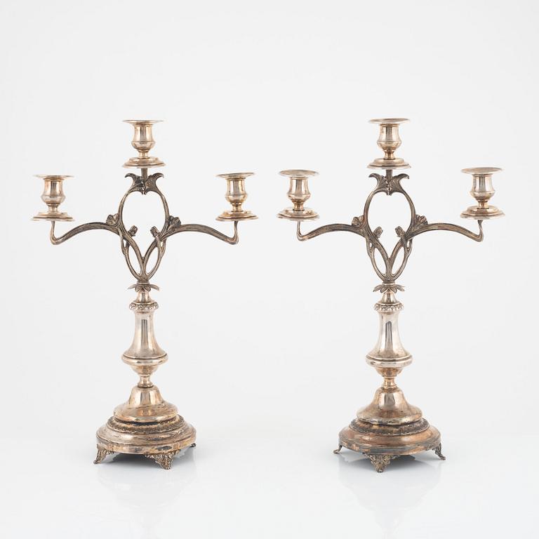 A pair of Art Nouveau silver plated candelabras, early 20th Century.