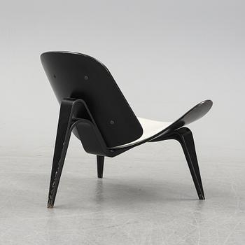 Hans J Wegner, a 'The Smiling Chair/CH07' easy chair from Carl Hansen & Søn, Odense, Denmark.