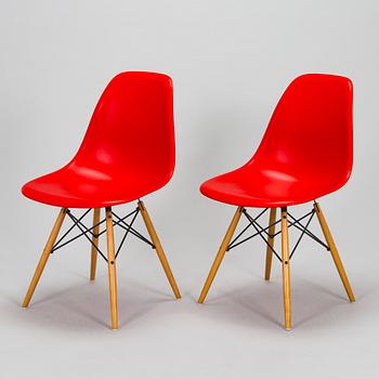 Charles & Ray Eames, two 'Plastic Chair DSW' chairs, Vitra.