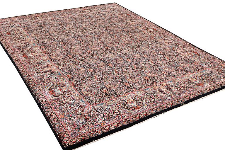 A Boteh pattern Kerman carpet, c. 475 x 342 cm.