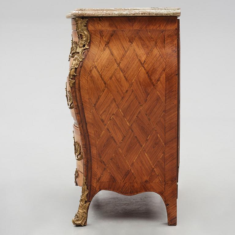 A rococo parquetry and gilt-brass mounted commode by C. Linning (master 1744-1779).