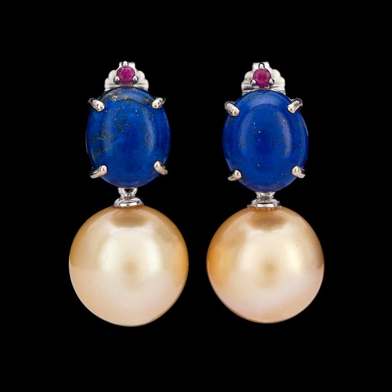 A pair of lapis lasuli, cultured South Sea pearl and ruby earrings.