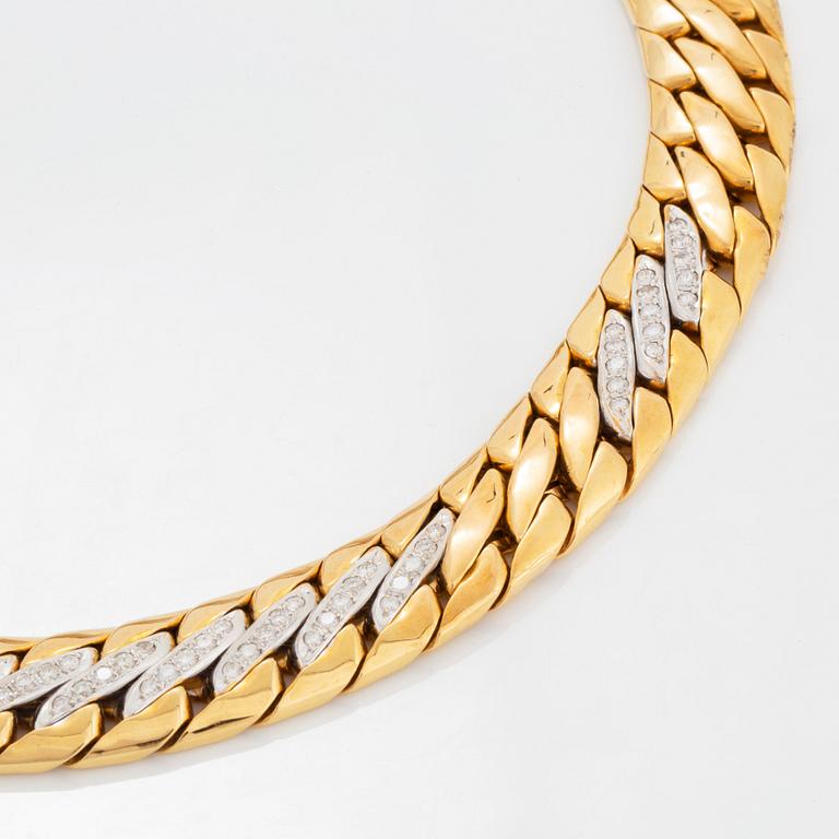 A Bucherer necklace in 18K gold set with round brilliant-cut diamonds.