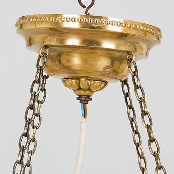 Kattovalaisin, 1900-luvun alku.