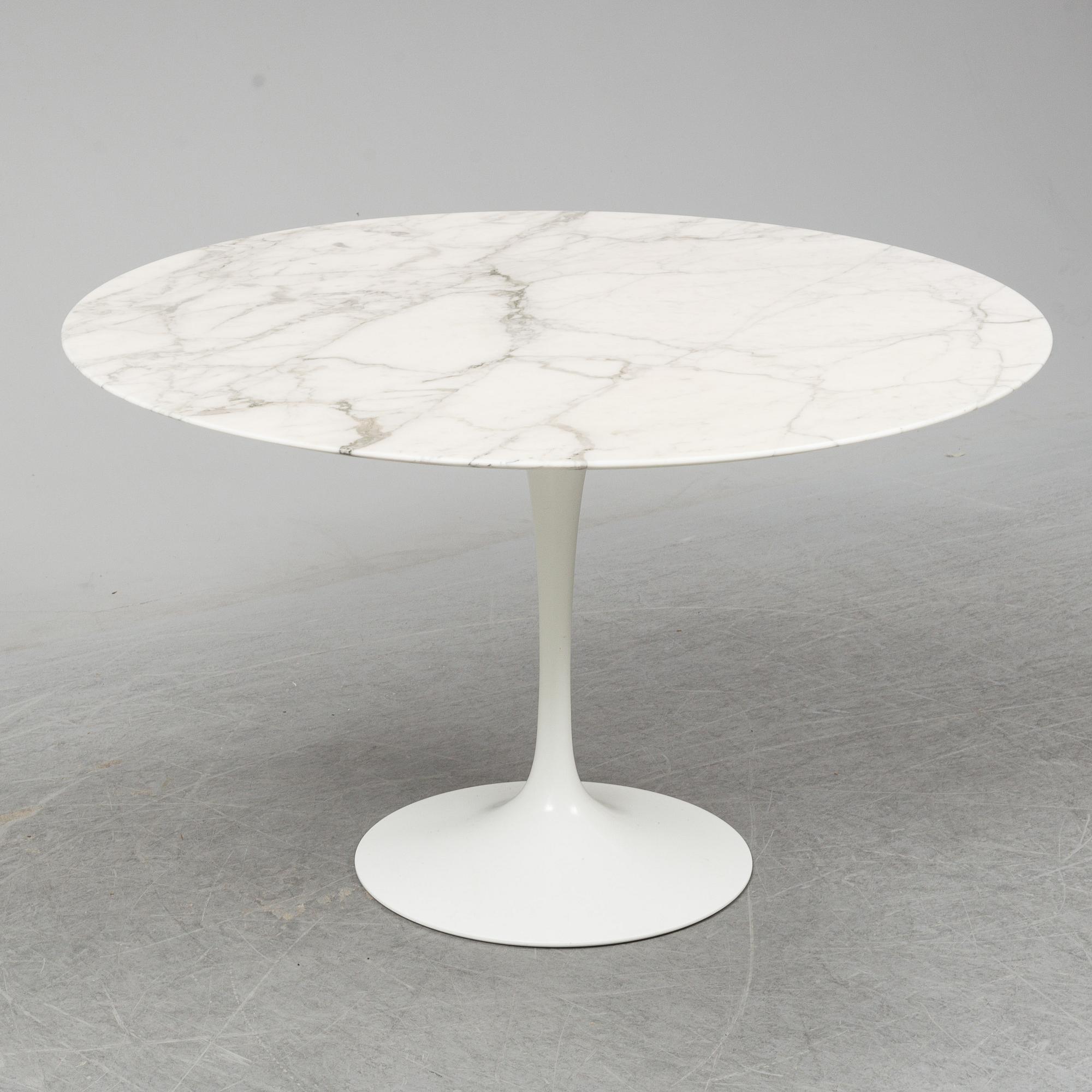 EERO SAARINEN, a 'Tulip' table by Knoll.