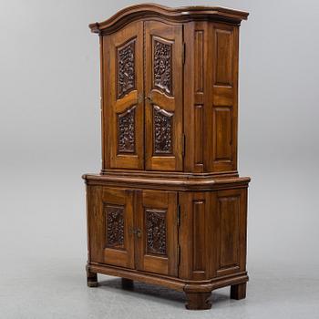 An 18th century walnut cabinet.