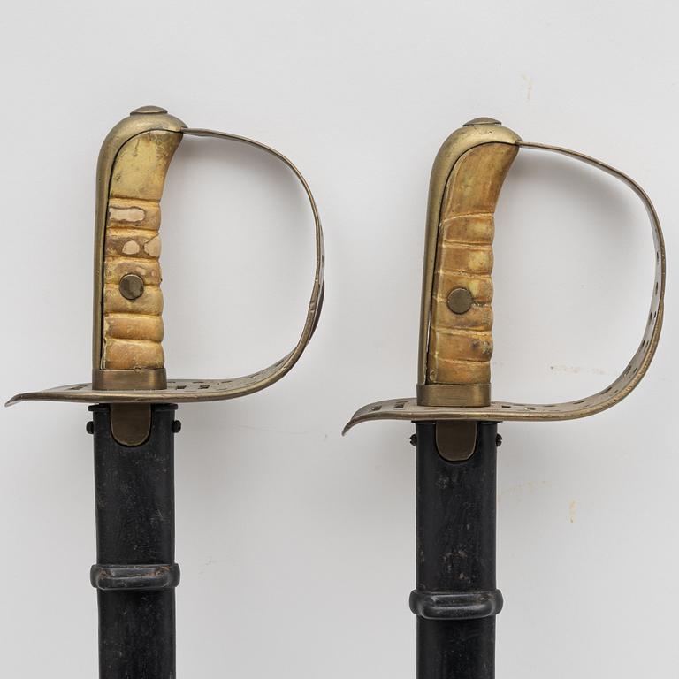 Two cavalry sabres, Swedish, m/1867-93 with scabbard.