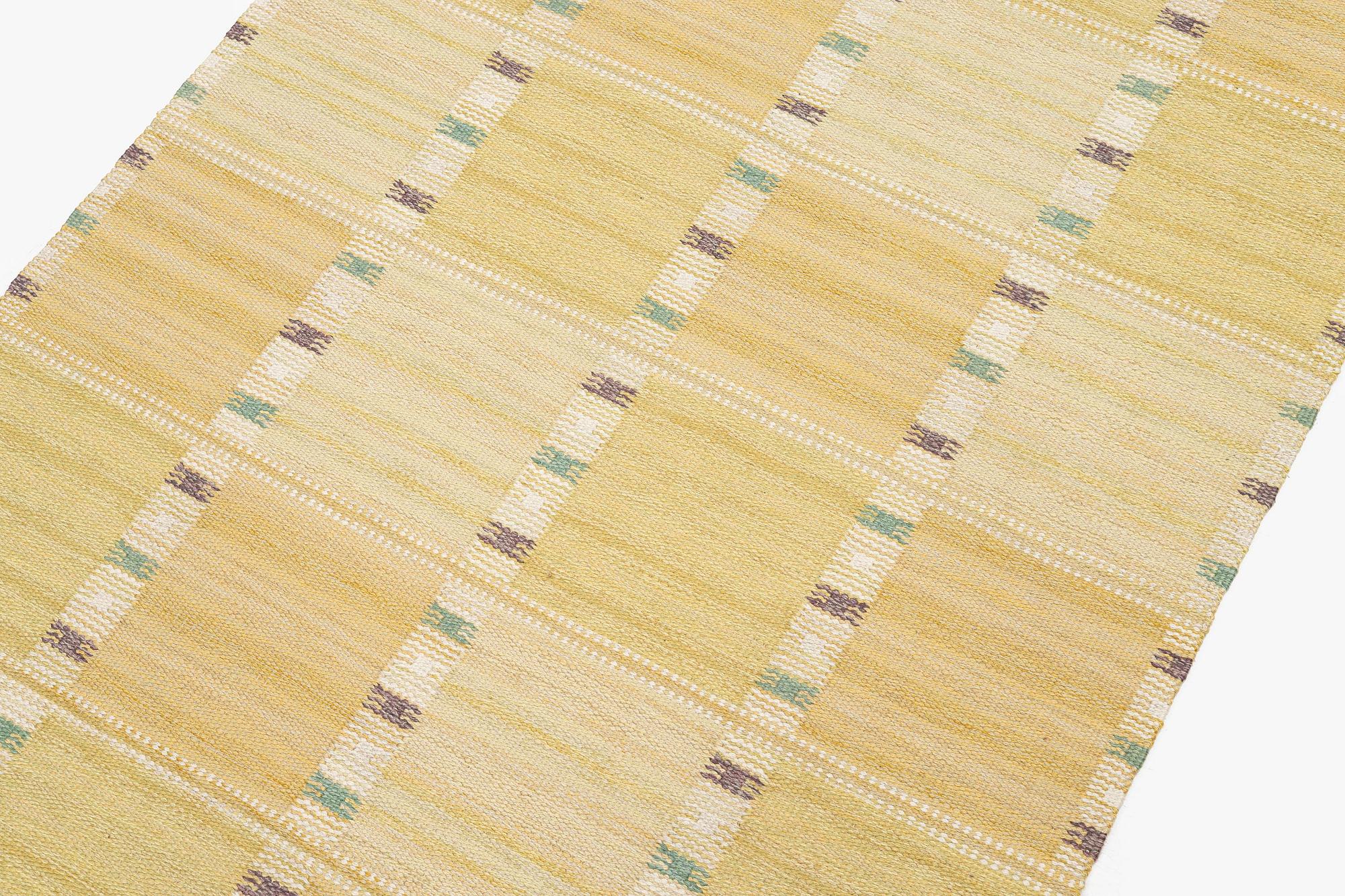 Barbro Nilsson, a 'Falurutan, gul' carpet, flat weave, c. 172 x 118 cm signed AB MMF BN.