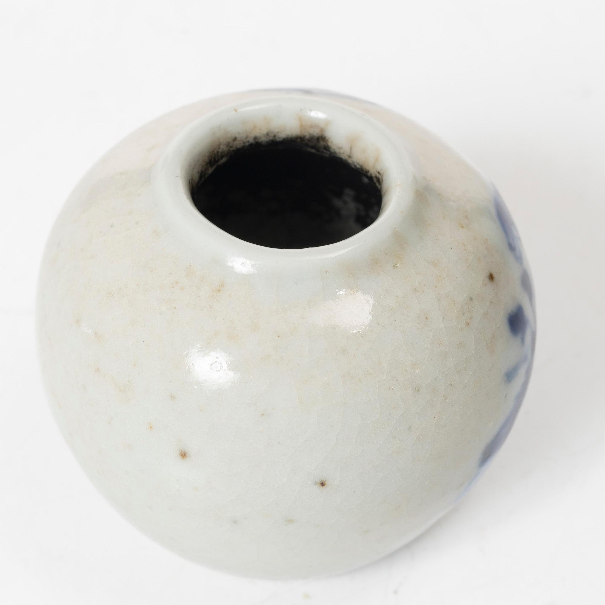 A Chinese blue and white porcelain brush washer / vase and a metal and tortoise shell nail guard, Qing dynasty.