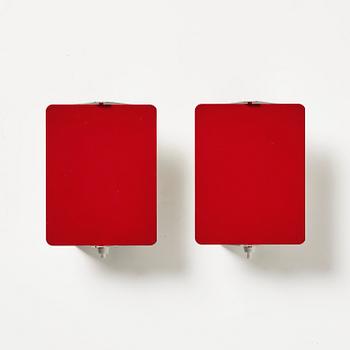 Charlotte Perriand, a pair of wall lights model "CP1", La Société Centrale d'Eclairage, France, 1960s.