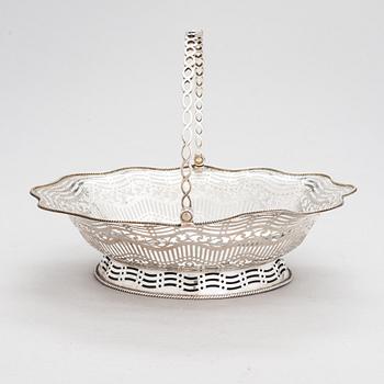 A George III sterling silver breadbasket, maker's mark of William Plummer, London 1777.