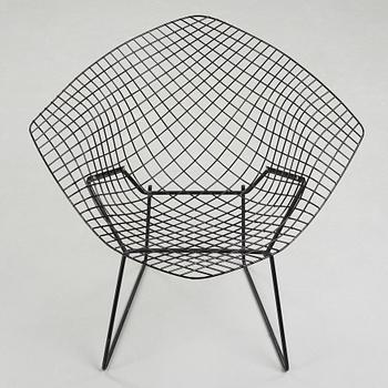 An easy chair "Diamond Chair" by Harry Bertoia.