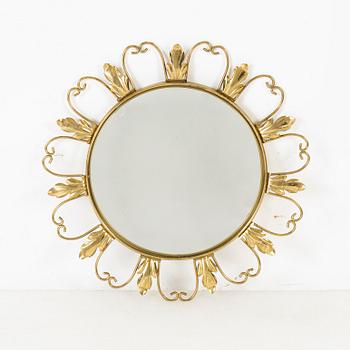 A brass mirror, second half of the 20th Century.