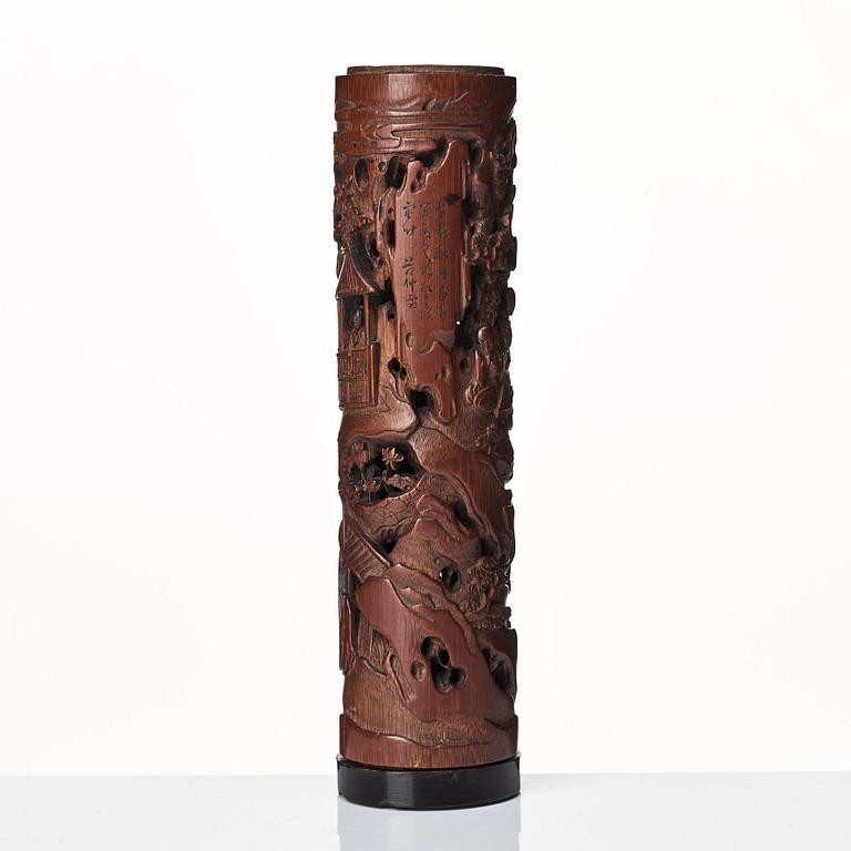 A carved cylindrical bambo parfumier, Qing dynasty, 19th Century.
