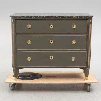 A Gustavian style chest of drawers, circa 1900.