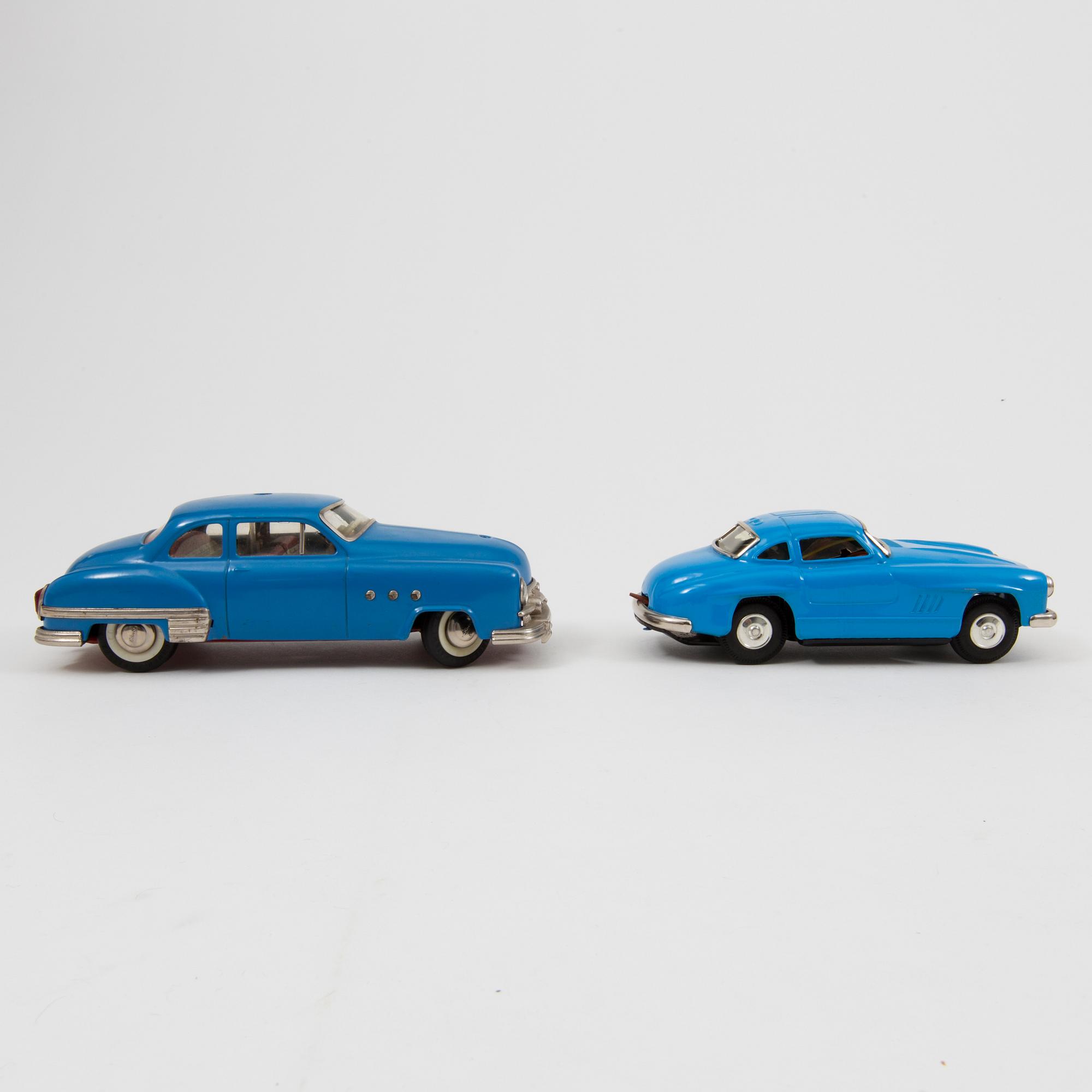 Two tinplate cars by Schuco and Kato Sairen German and Japan 1950s.