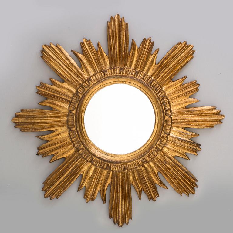 A late 20th Century sun shaped mirror.