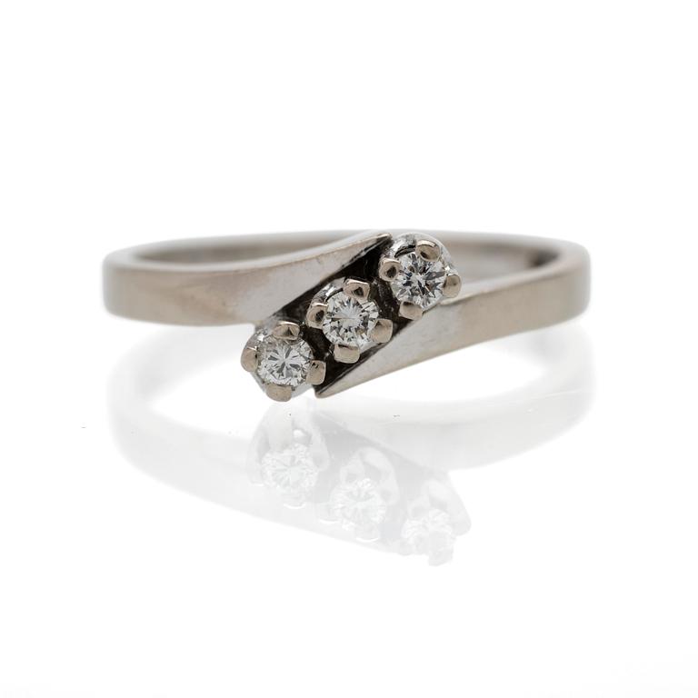 18K white gold ring with diamonds.