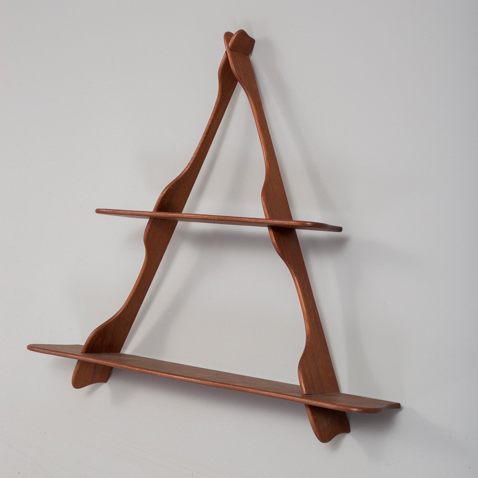 PEDER MOOS, A teak 'Amager' wall shelf, Denmark, mid 20th Century.